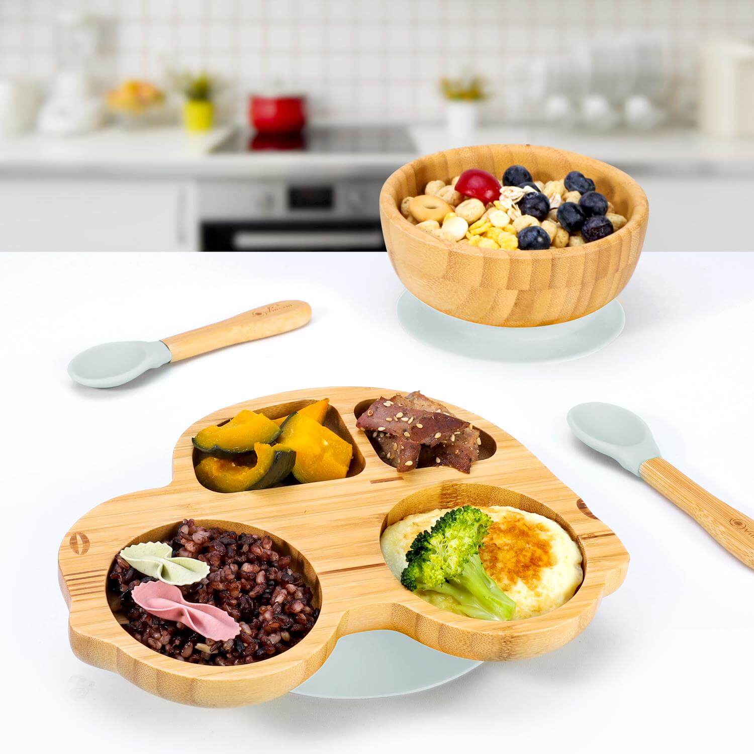 Natural bamboo 4-section plate with bowl and spoons for kids, featuring non-slip base and easy-clean design, perfect for balanced meals.