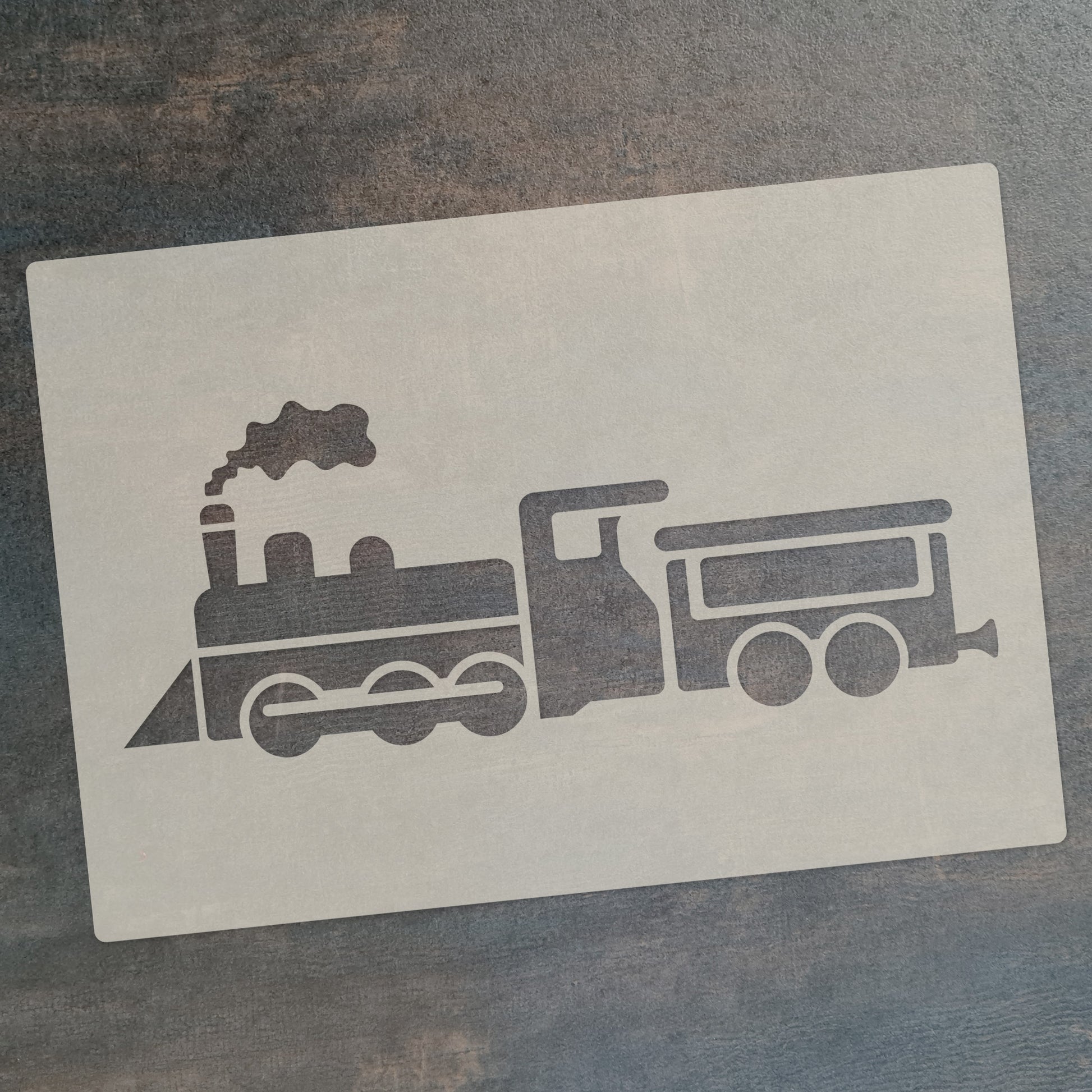 Steam train stencil set featuring a classic steam engine and a car, perfect for craft projects and cake decorating.