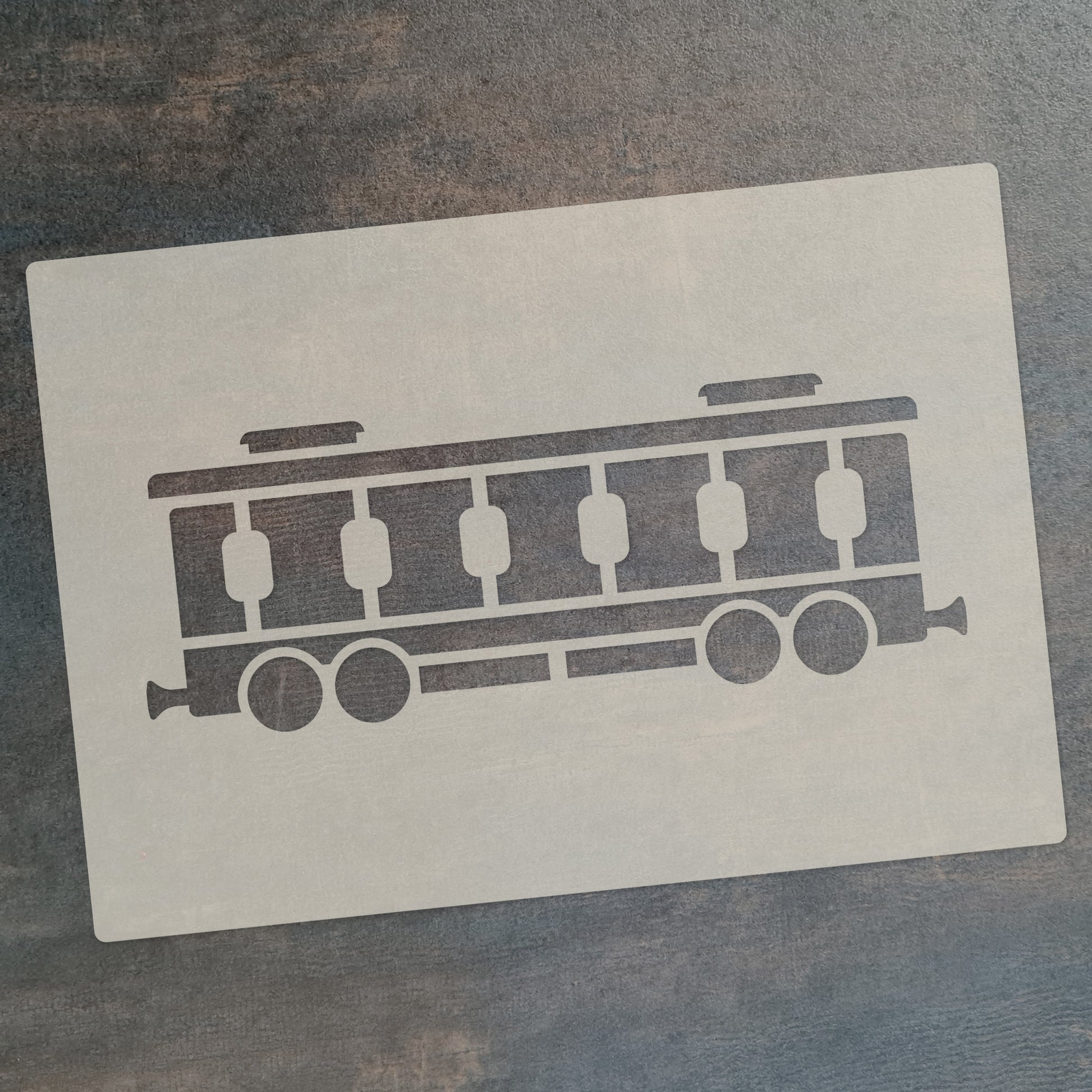 Steam train stencil set design featuring a passenger carriage for crafts and cake decorating.