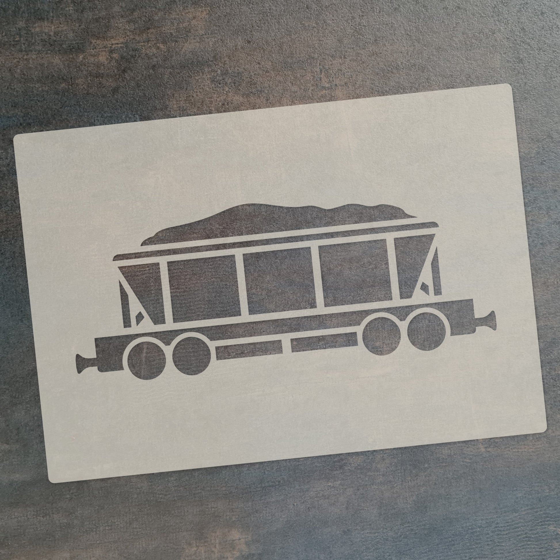 Steam train stencil set design featuring a hopper car with a load for crafts and decorating.