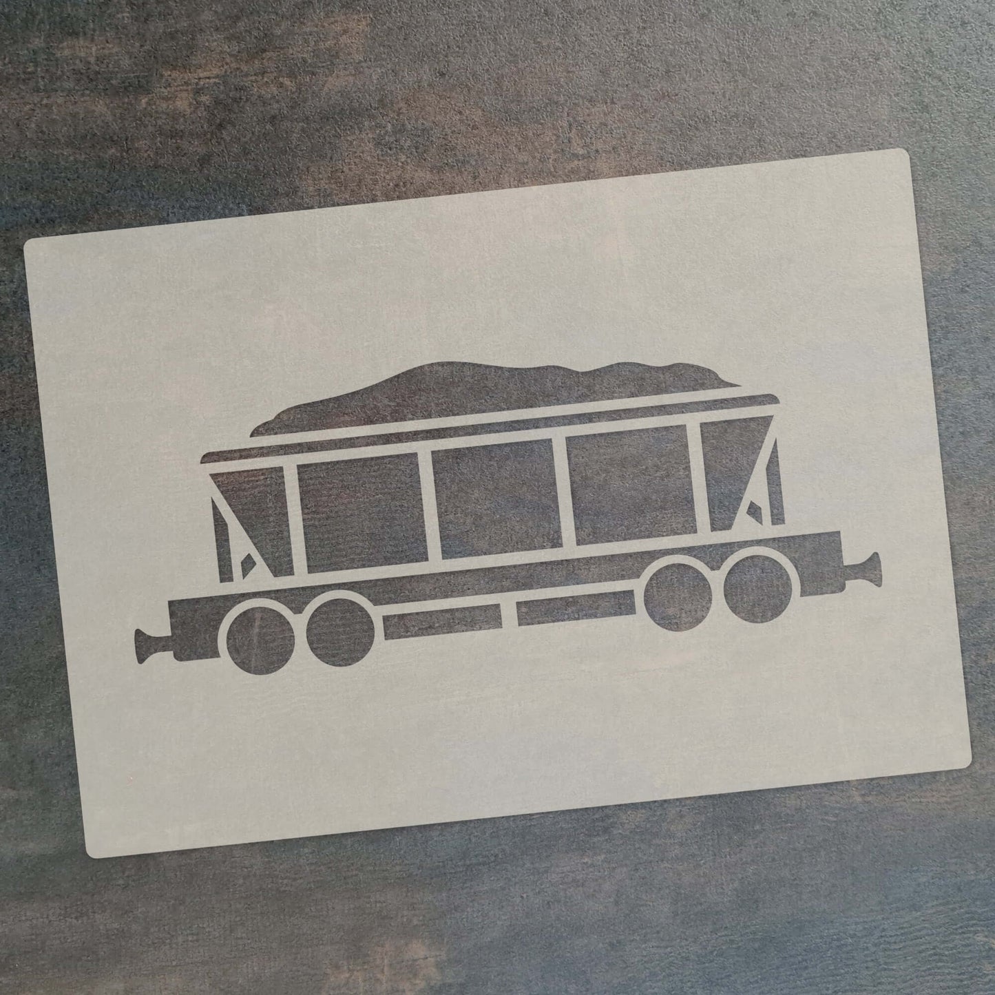 Steam train stencil set design featuring a hopper car with a load for crafts and decorating.