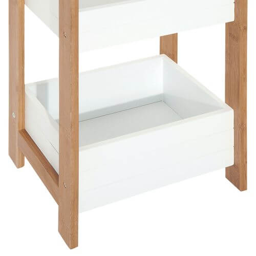 Close-up of 3-tier bamboo bathroom shelf showcasing white drawers and sturdy construction, perfect for eco-friendly storage.