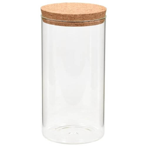 Transparent glass storage jar with cork lid, ideal for organizing kitchen dry foods.
