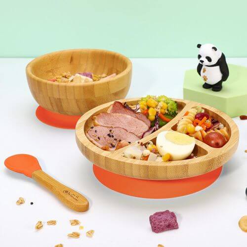 Vinsani natural bamboo kids bowl and plate set with non-slip base and spoon, featuring colorful food and a panda toy.