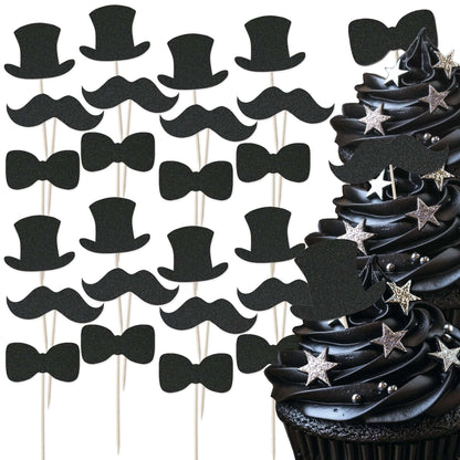 Gentleman themed glitter cupcake toppers set featuring top hats, moustaches, and bow ties on stylish black cupcakes.