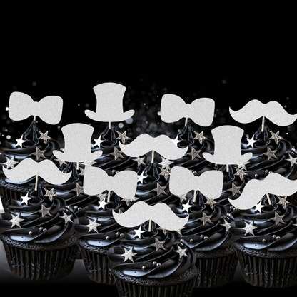 Gentleman themed glitter cupcake toppers on black frosted cupcakes, featuring top hats, bow ties, and moustaches.