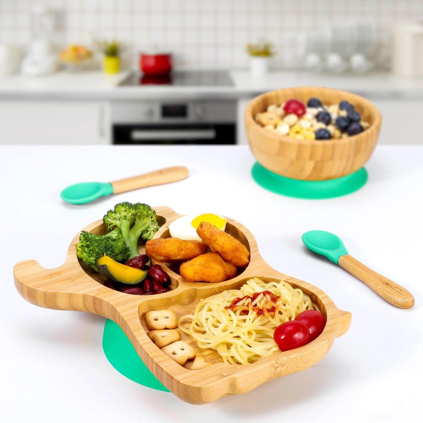 Vinsani bamboo 3-section plate with food, bowl, and spoons for kids, showcasing a fun and durable design for mealtime.