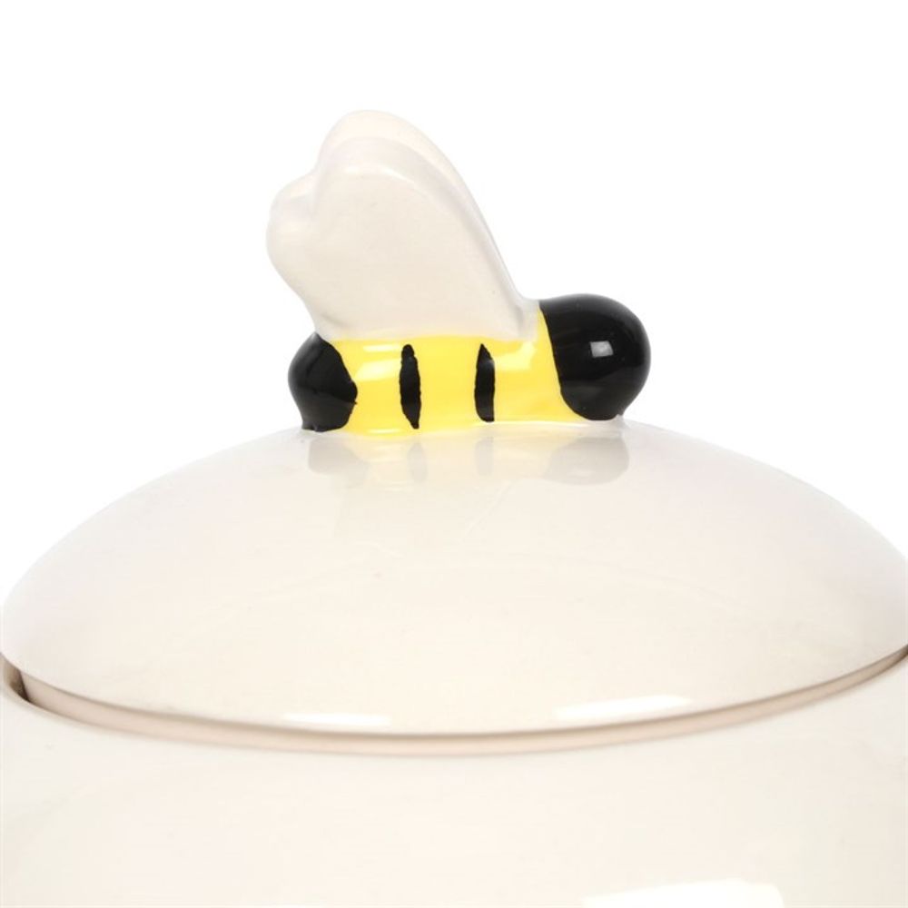 Close Up Of Bee Handle On Bee Happy White Ceramic Storage Jar