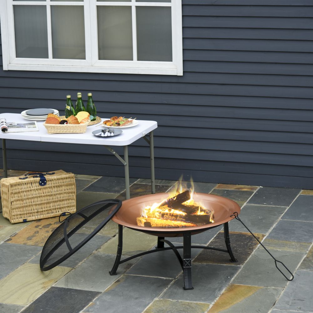 Outdoor Patio Steel Fire Pit Bowl With Spark Screen Cover In Use